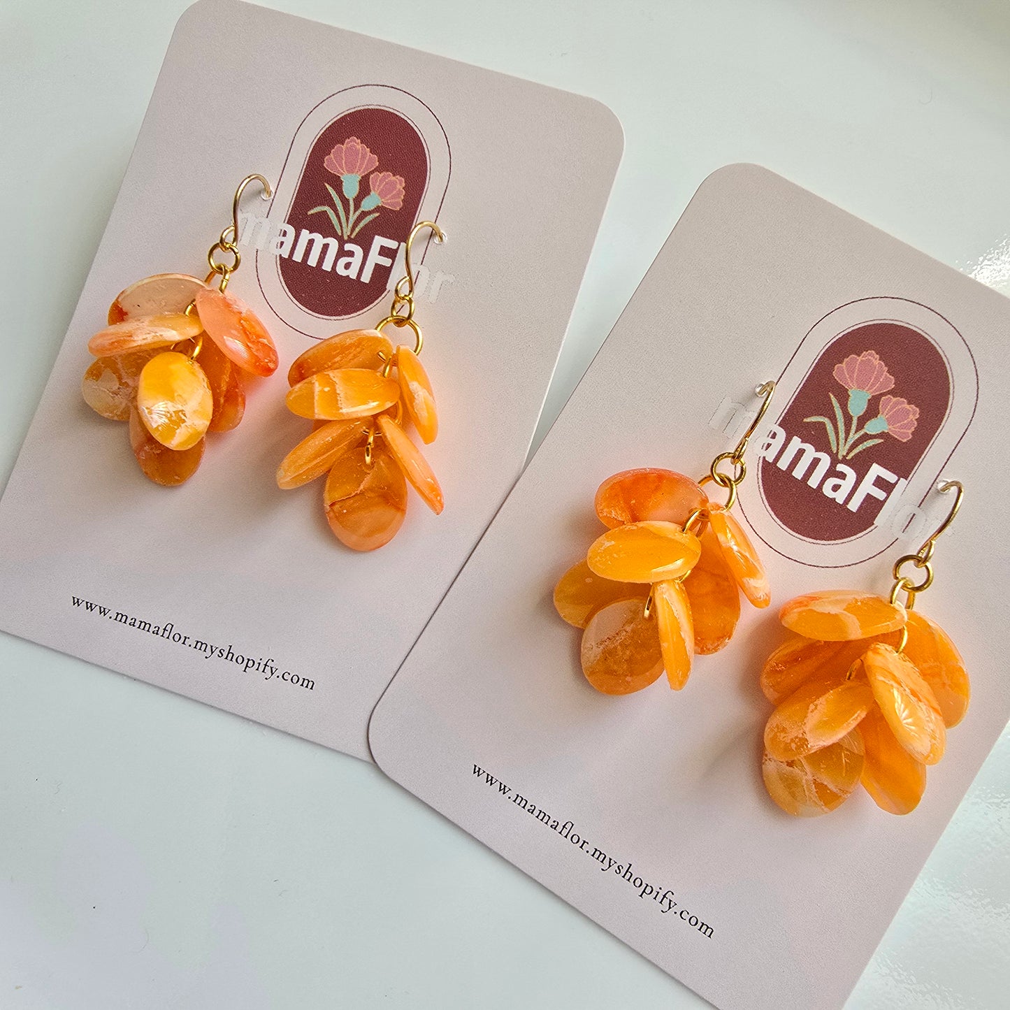 Ada Cascade Earrings in translucent citrus orange marbling