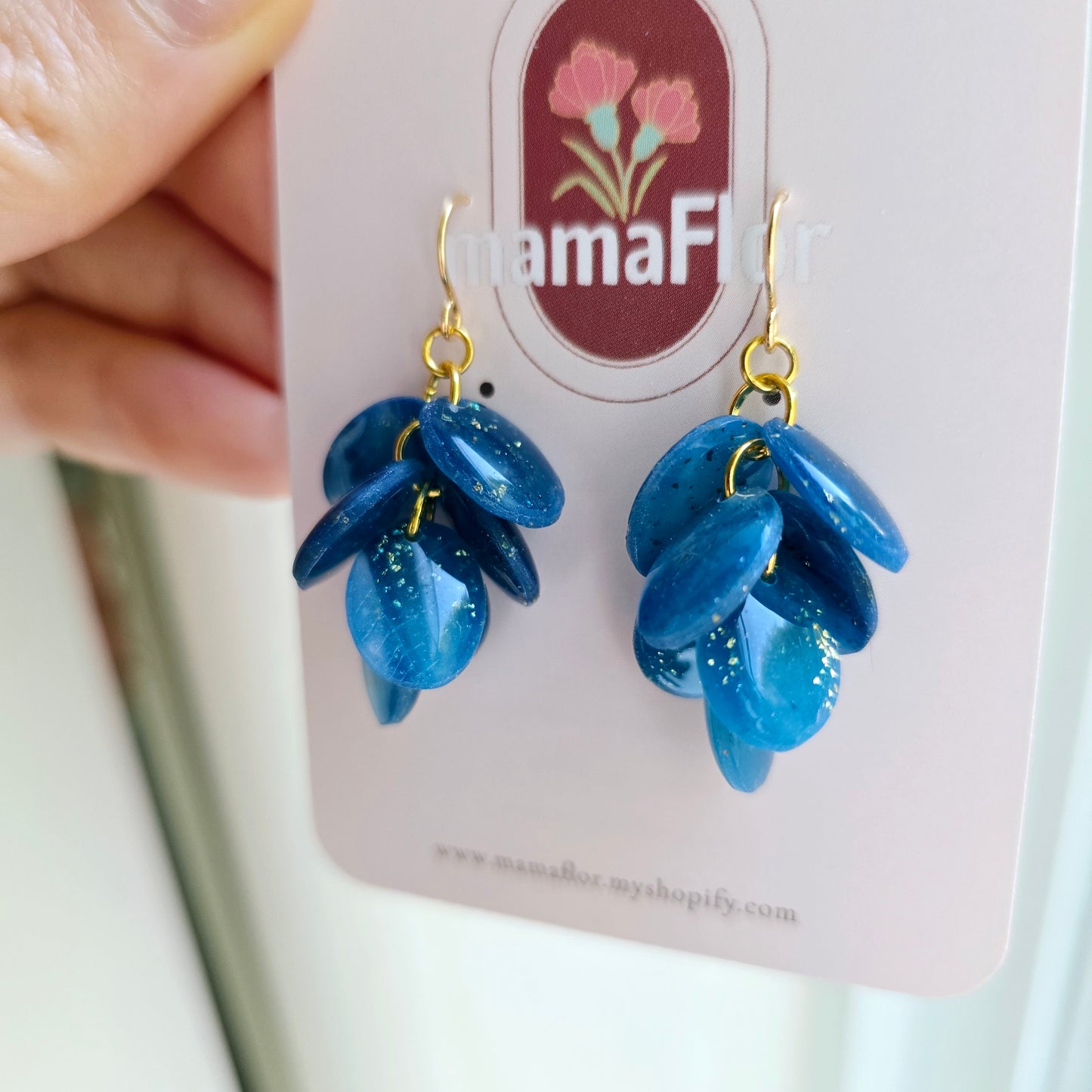Ada Cascade Earrings in translucent speckled blue
