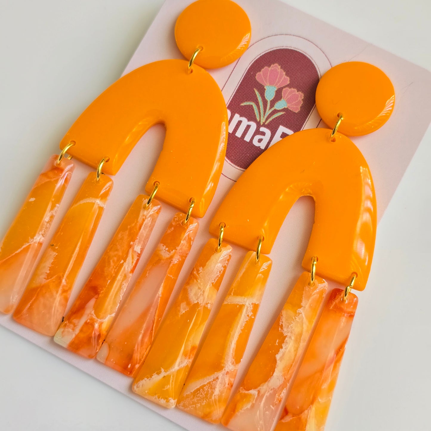 Arco Dangle Earrings in clementine