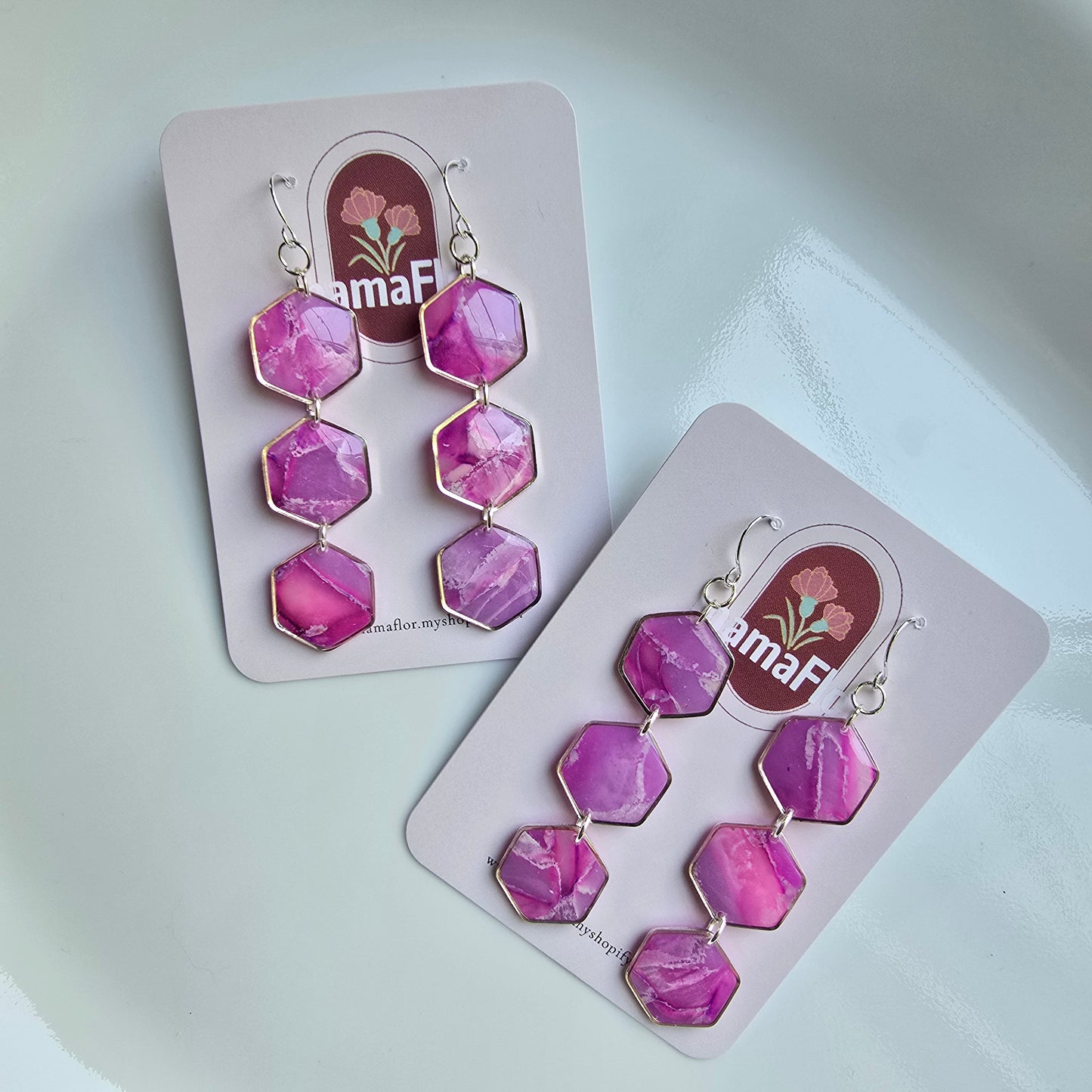 Trés Hex Hook Earrings in translucent magenta marbling