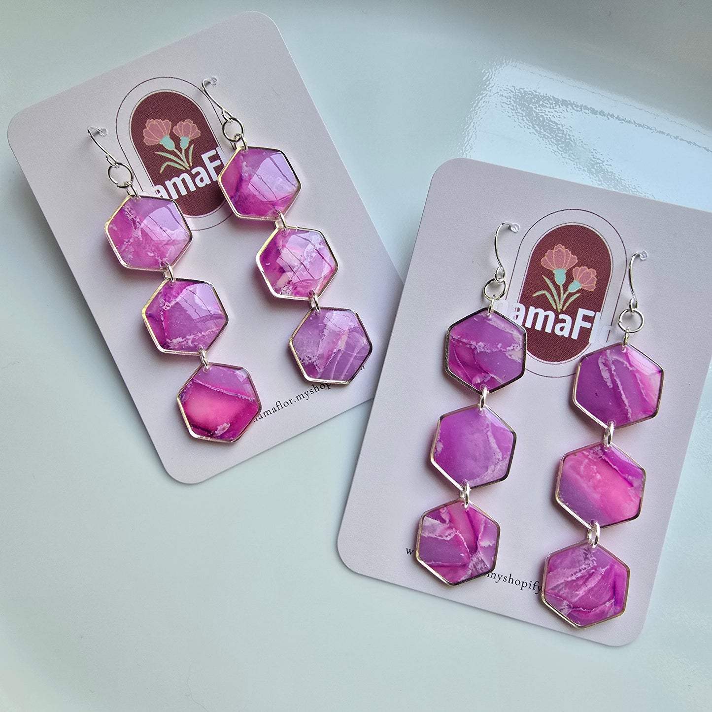 Trés Hex Hook Earrings in translucent magenta marbling