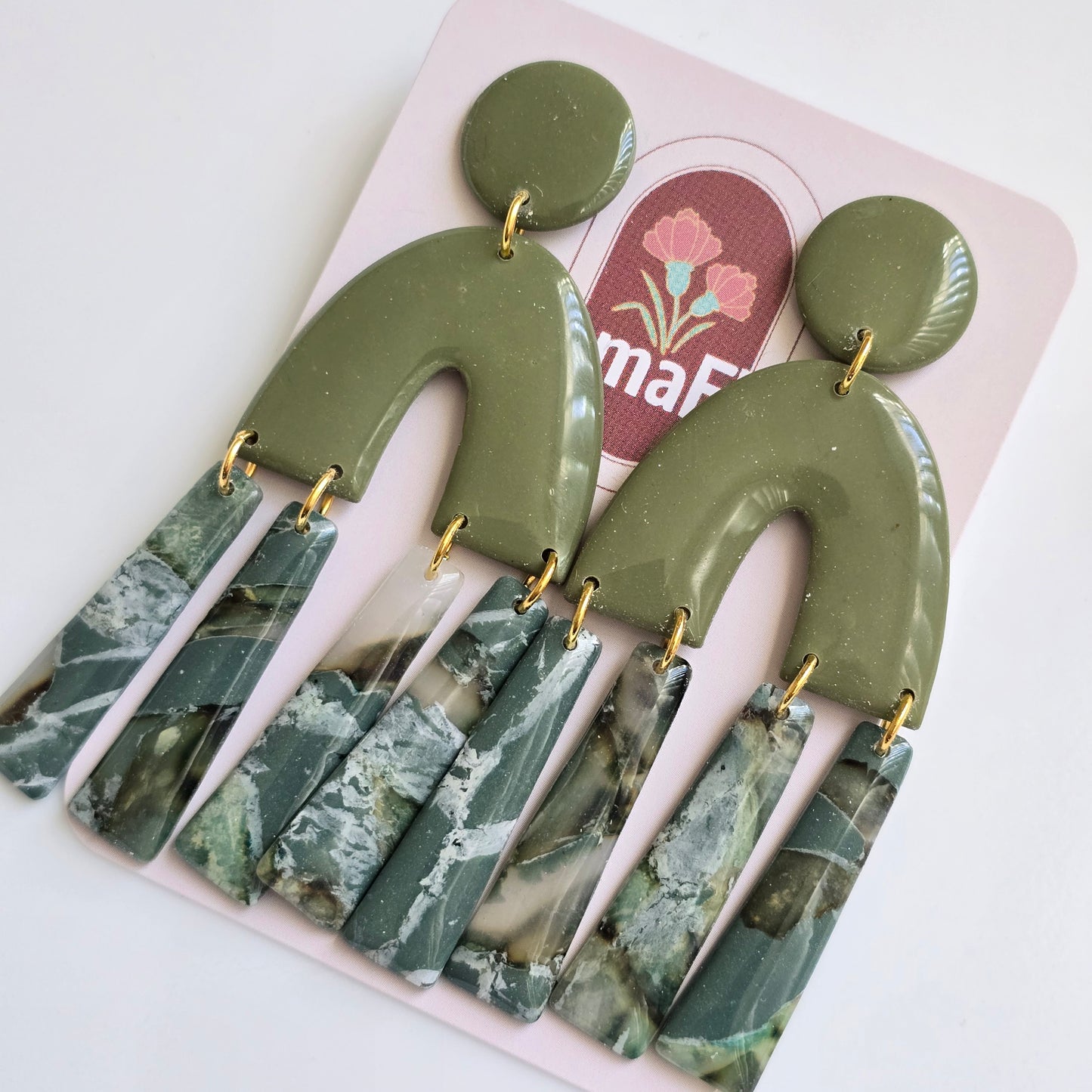 Arco Dangle Earrings in earth greens
