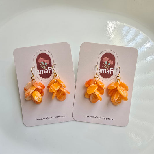 Ada Cascade Earrings in translucent citrus orange marbling