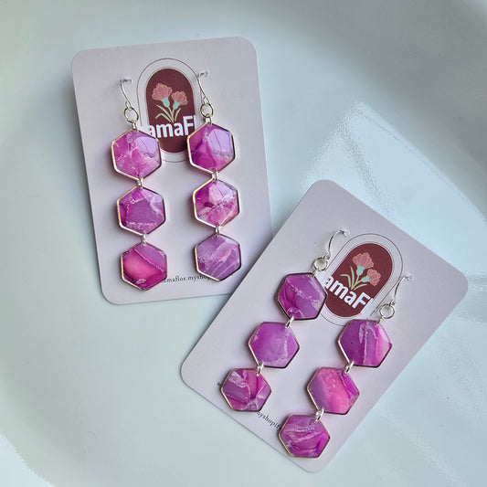 Trés Hex Hook Earrings in translucent magenta marbling